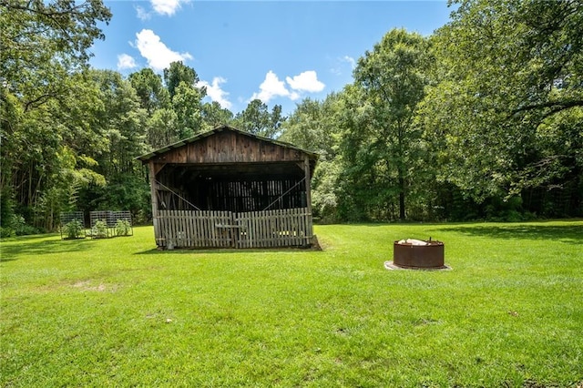 67 Dixie Park Rd, Rome, GA 30165 - view of green lawn featuring an outbuilding and a view of trees