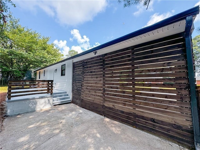 exterior space featuring a wooden deck