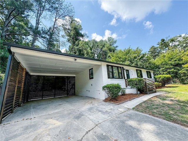 view of front of house with a carport