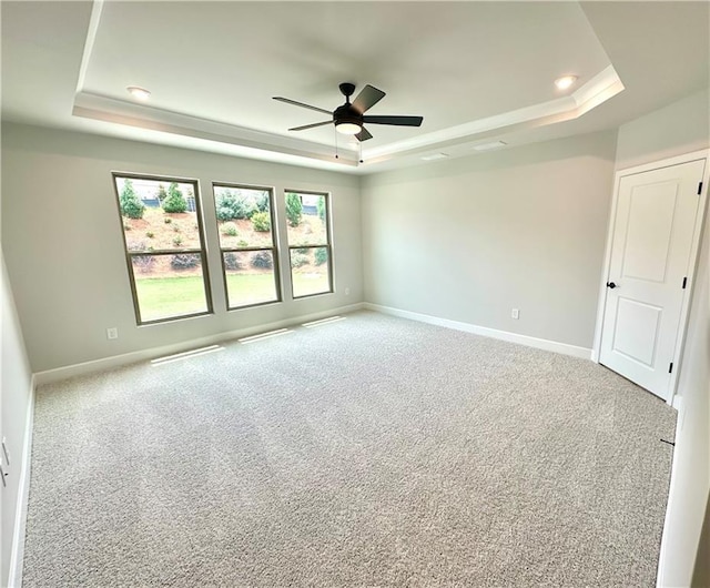 2608 Turnwater St, Hoschton, GA 30548 - carpeted empty room featuring a tray ceiling and ceiling fan