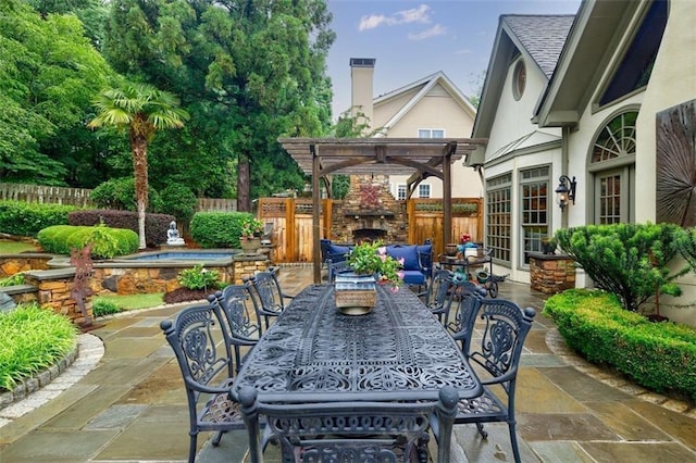 5318 Brooke Farm Dr, Dunwoody, GA 30338 - view of patio / terrace with outdoor dining area, an outdoor stone fireplace, a pergola, and a jacuzzi