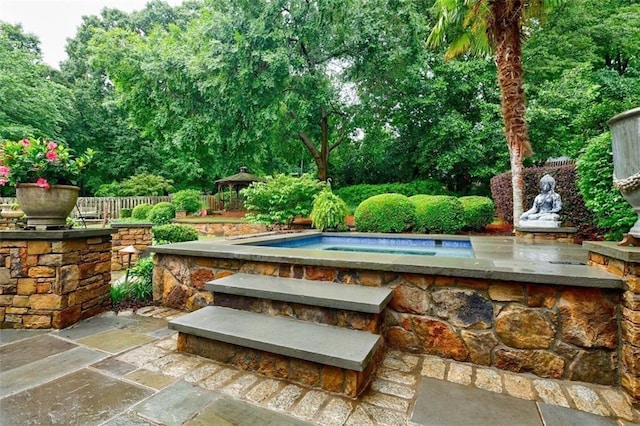 5318 Brooke Farm Dr, Dunwoody, GA 30338 - view of patio / terrace with a gazebo, a jacuzzi, and view of scattered trees