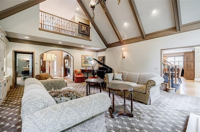 5318 Brooke Farm Dr, Dunwoody, GA 30338 - carpeted living area with high vaulted ceiling, arched walkways, beamed ceiling, recessed lighting, and crown molding