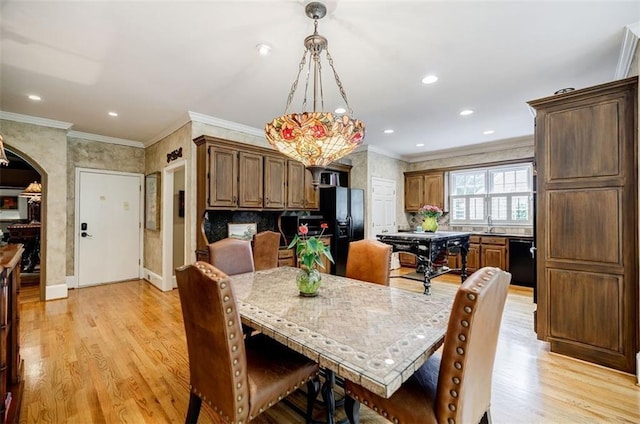5318 Brooke Farm Dr, Dunwoody, GA 30338 - dining room featuring arched walkways, crown molding, light wood-style floors, recessed lighting, and baseboards
