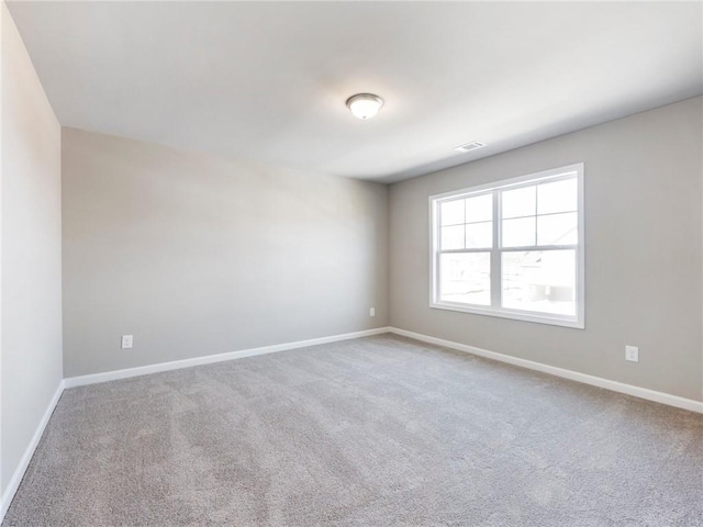 view of carpeted spare room