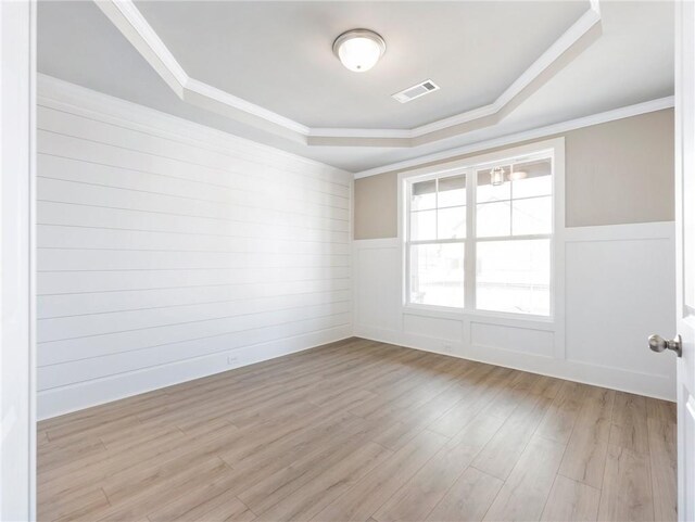 unfurnished living room featuring coffered ceiling, beamed ceiling, light hardwood / wood-style floors, and ceiling fan