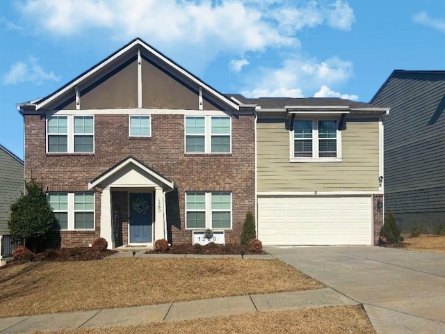 view of front of property with an attached garage, concrete driveway, and brick siding