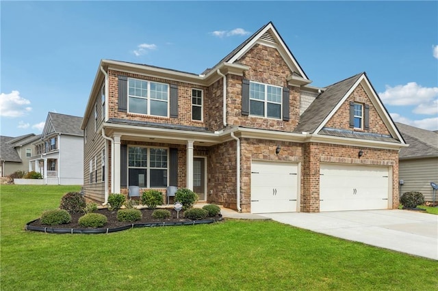 craftsman-style house with an attached garage, stone siding, concrete driveway, and a front yard