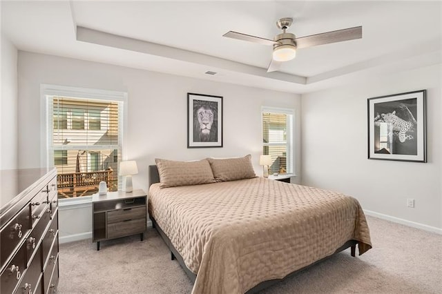 1590 Ridgebrook Downs, Mableton, GA 30126 - bedroom featuring a raised ceiling, light carpet, baseboards, and ceiling fan