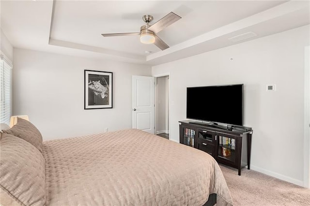1590 Ridgebrook Downs, Mableton, GA 30126 - bedroom featuring a raised ceiling, light carpet, baseboards, and a ceiling fan
