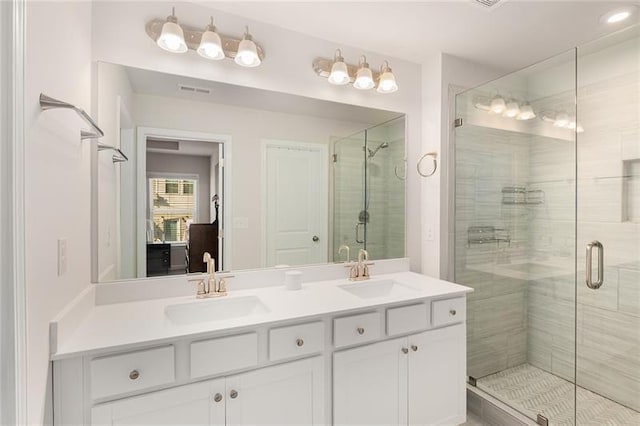 1590 Ridgebrook Downs, Mableton, GA 30126 - bathroom with a shower stall, double vanity, and recessed lighting