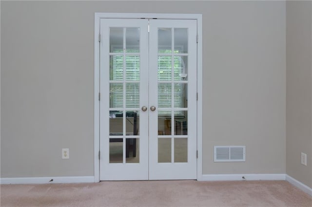 118 Brendylynn Trce, Woodstock, GA 30188 - entryway with french doors, light carpet, and baseboards