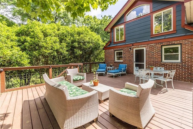 wooden deck with outdoor lounge area and outdoor dining space