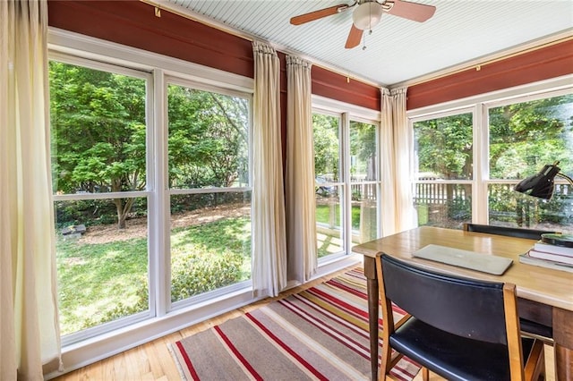 sunroom featuring wood finished floors