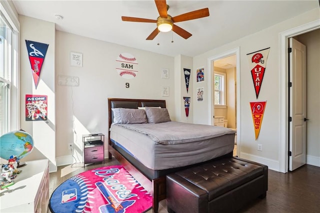 114 Village Green Ave, Woodstock, GA 30189 - bedroom with dark wood-type flooring, baseboards, and a ceiling fan