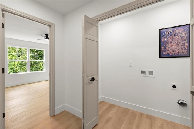 clothes washing area featuring hookup for an electric dryer, light wood finished floors, ceiling fan, baseboards, and hookup for a washing machine