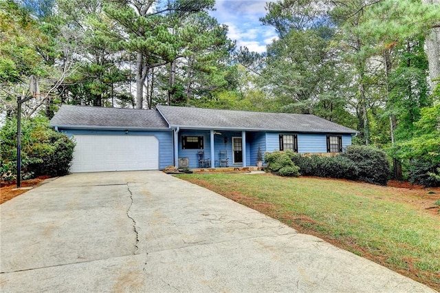 single story home with a garage and a front yard