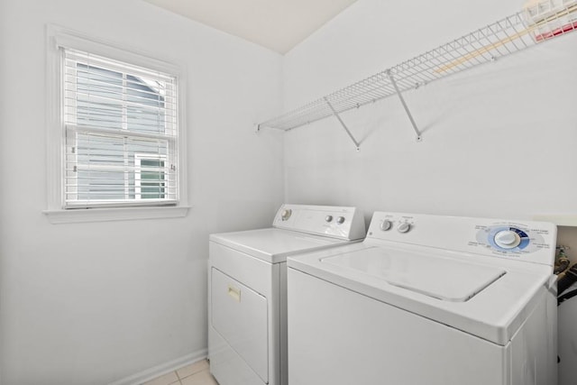 3242 Monarch Pine Dr, Peachtree Corners, GA 30071 - laundry area with washer and clothes dryer, baseboards, and light tile patterned flooring