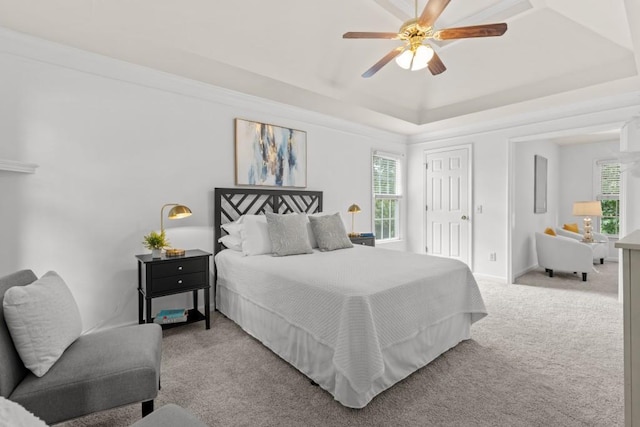 3242 Monarch Pine Dr, Peachtree Corners, GA 30071 - carpeted bedroom with a tray ceiling, a closet, a ceiling fan, and baseboards