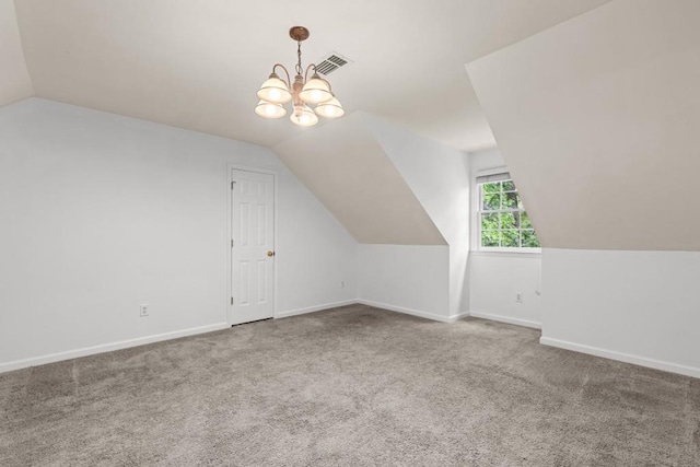3242 Monarch Pine Dr, Peachtree Corners, GA 30071 - bonus room featuring vaulted ceiling, a chandelier, carpet, and baseboards