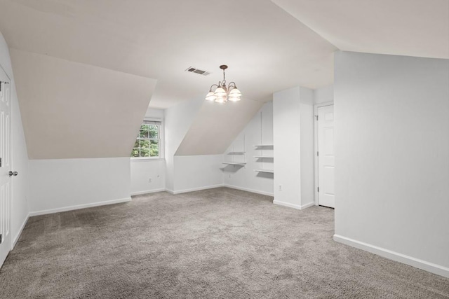 3242 Monarch Pine Dr, Peachtree Corners, GA 30071 - additional living space featuring vaulted ceiling, carpet, baseboards, and a chandelier
