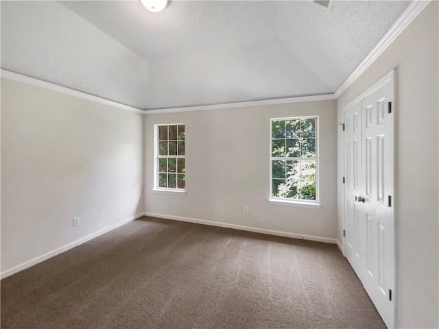 5159 Round Table Dr, Ellenwood, GA 30294 - unfurnished bedroom with crown molding, carpet flooring, vaulted ceiling, and a closet