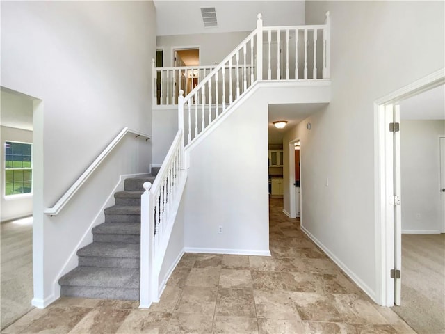 5159 Round Table Dr, Ellenwood, GA 30294 - stairway featuring a towering ceiling