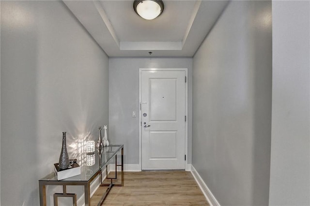 285 Centennial Olympic Park Dr NW Unit 1905, Atlanta, GA 30339 - doorway with wood finished floors and a raised ceiling