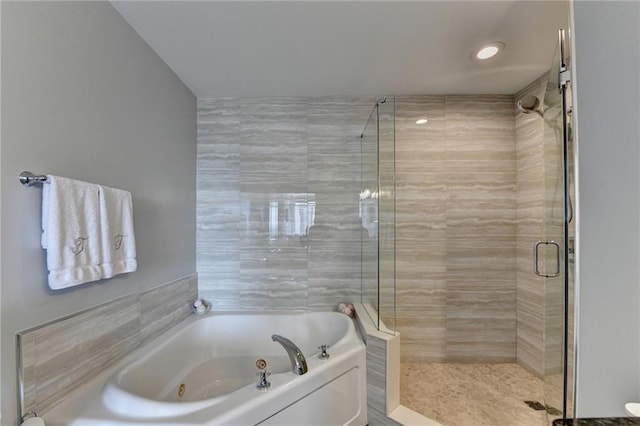 285 Centennial Olympic Park Dr NW Unit 1905, Atlanta, GA 30339 - bathroom with a tub with jets, a shower stall, and recessed lighting
