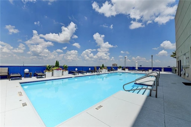 285 Centennial Olympic Park Dr NW Unit 1905, Atlanta, GA 30339 - community pool featuring a patio area