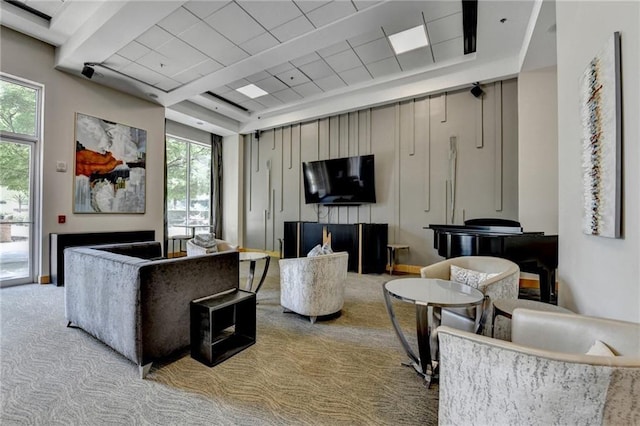 285 Centennial Olympic Park Dr NW Unit 1905, Atlanta, GA 30339 - carpeted living room with a tray ceiling