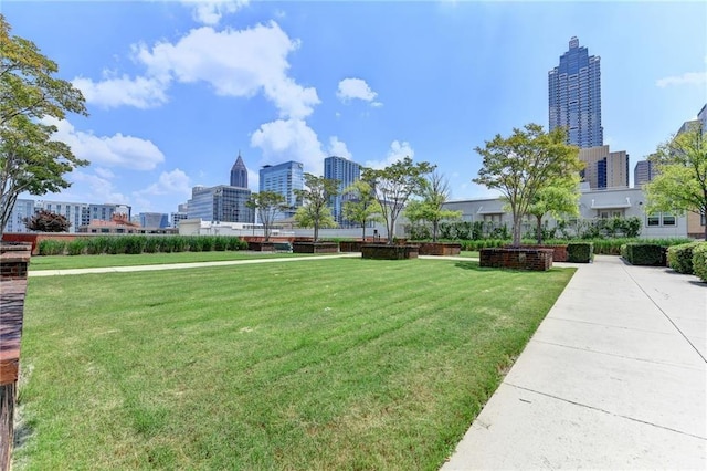 285 Centennial Olympic Park Dr NW Unit 1905, Atlanta, GA 30339 - view of community featuring a view of city and a lawn