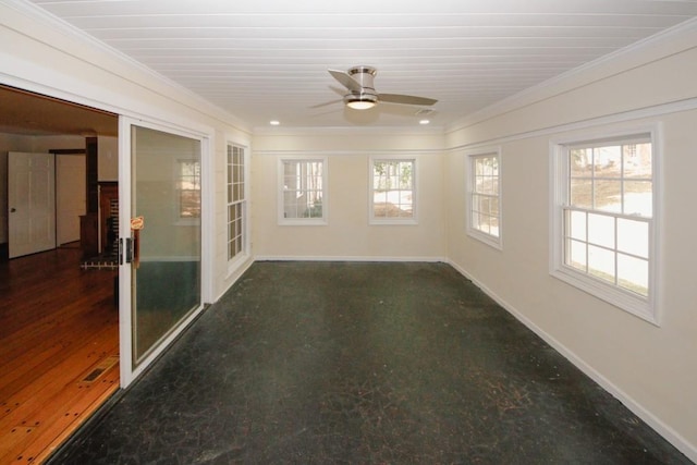 unfurnished sunroom with a ceiling fan