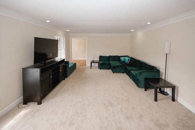 living room with baseboards, crown molding, and light colored carpet