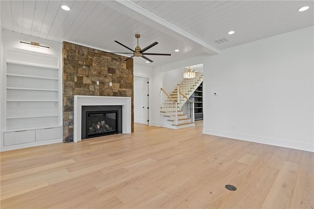unfurnished living room with stairway, light wood-style floors, visible vents, and recessed lighting