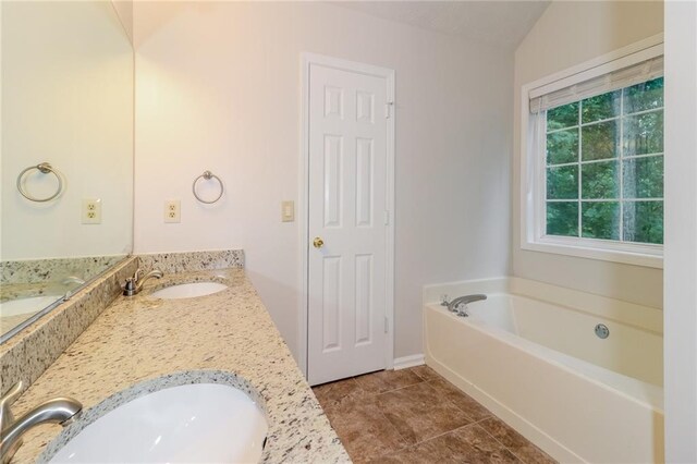 5526 Chestnut Creek Ln, Flowery Branch, GA 30542 - full bathroom featuring a sink, baseboards, a garden tub, and double vanity