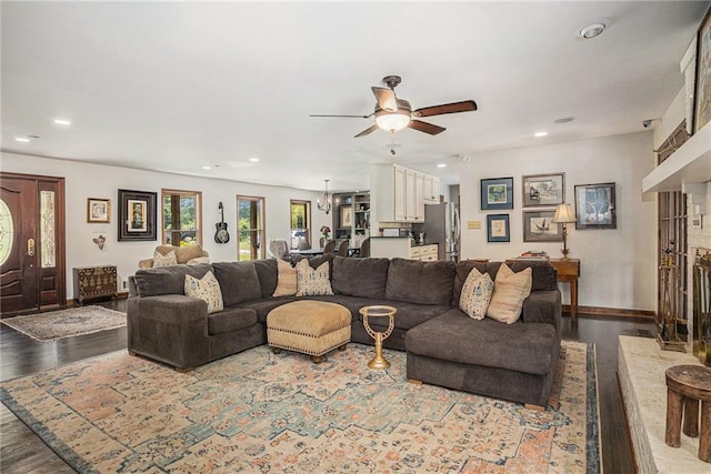 2452 Camp Mitchell Rd, Grayson, GA 30017 - living room with wood finished floors, ceiling fan, recessed lighting, and baseboards