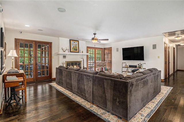 2452 Camp Mitchell Rd, Grayson, GA 30017 - living room with baseboards, recessed lighting, french doors, dark wood-type flooring, and a ceiling fan