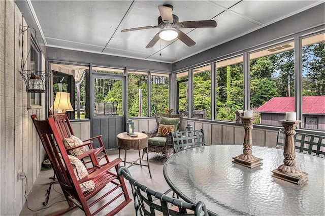 2452 Camp Mitchell Rd, Grayson, GA 30017 - sunroom with ceiling fan and outdoor dining area