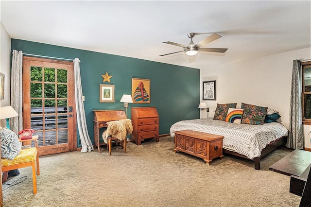 2452 Camp Mitchell Rd, Grayson, GA 30017 - carpeted bedroom featuring access to outside, ceiling fan, and baseboards