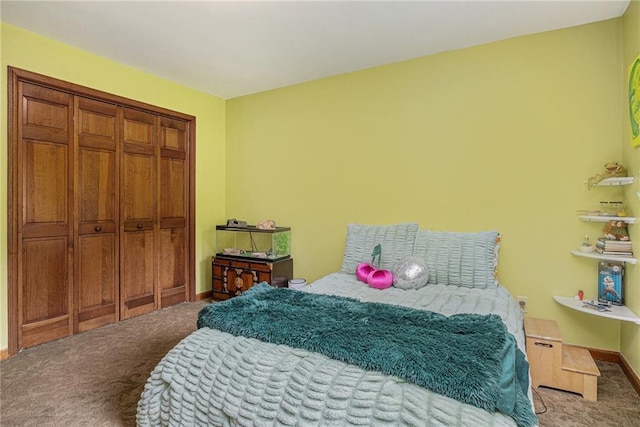 2452 Camp Mitchell Rd, Grayson, GA 30017 - carpeted bedroom with a closet and baseboards