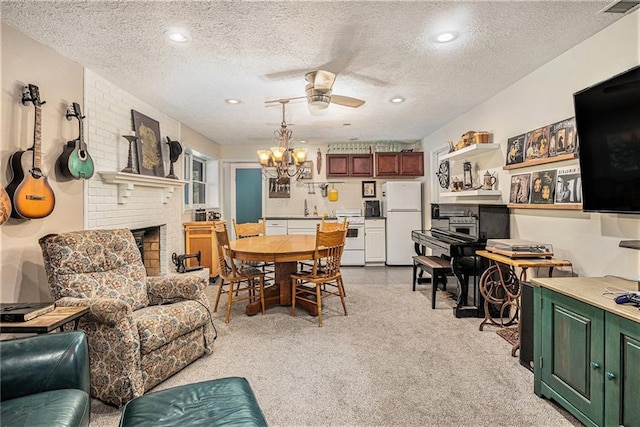 2452 Camp Mitchell Rd, Grayson, GA 30017 - dining room featuring a textured ceiling, a brick fireplace, ceiling fan, light carpet, and recessed lighting