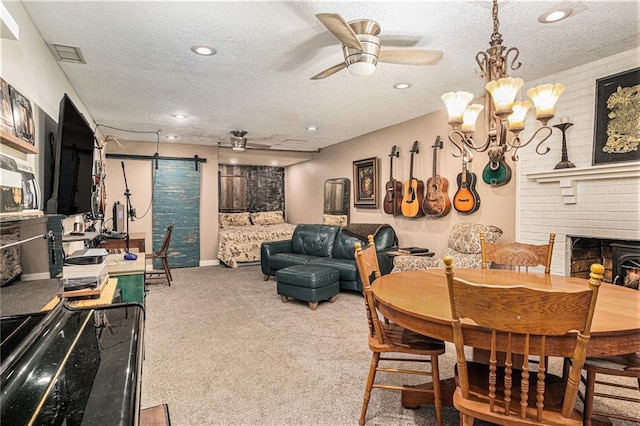 2452 Camp Mitchell Rd, Grayson, GA 30017 - dining room with carpet, a ceiling fan, a brick fireplace, a textured ceiling, and recessed lighting