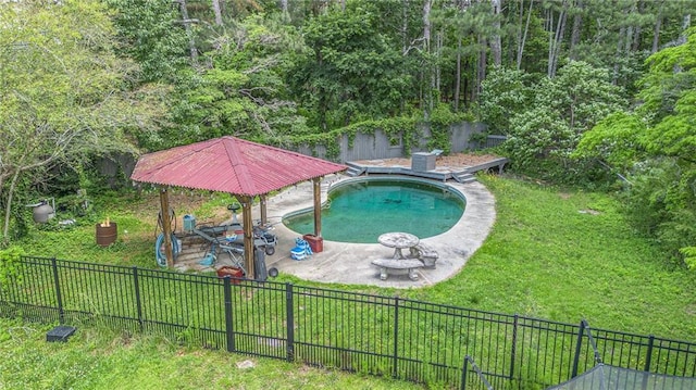 2452 Camp Mitchell Rd, Grayson, GA 30017 - view of pool with a patio area and a view of trees