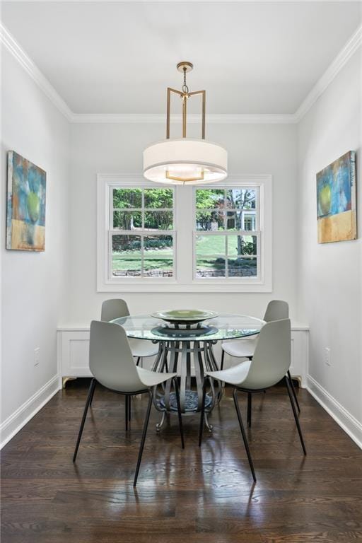 4152 Club Dr NE, Atlanta, GA 30319 - dining space featuring dark wood finished floors, a wealth of natural light, and ornamental molding