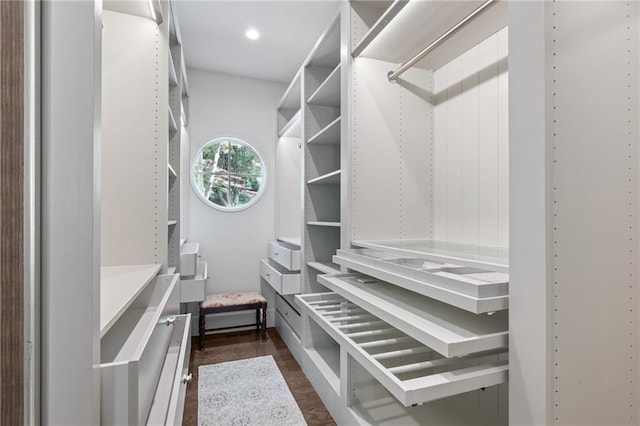 4152 Club Dr NE, Atlanta, GA 30319 - walk in closet with dark wood-style floors
