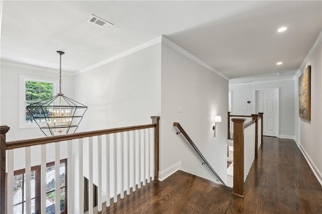 4152 Club Dr NE, Atlanta, GA 30319 - hall featuring crown molding, an upstairs landing, visible vents, a notable chandelier, and dark wood-style floors