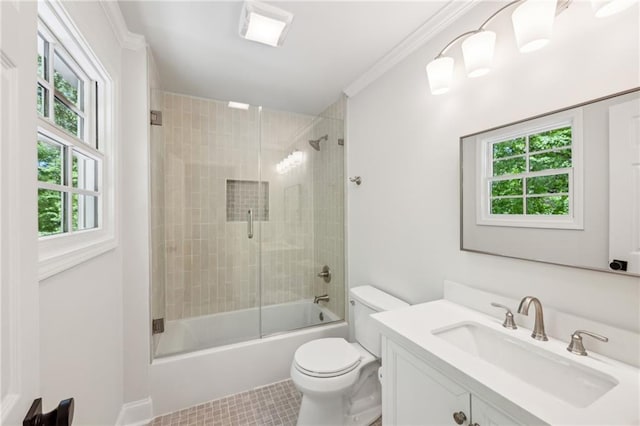 4152 Club Dr NE, Atlanta, GA 30319 - bathroom with vanity, bath / shower combo with glass door, toilet, ornamental molding, and tile patterned flooring
