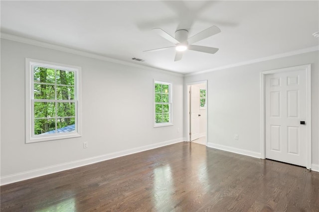 4152 Club Dr NE, Atlanta, GA 30319 - spare room with baseboards, visible vents, a ceiling fan, crown molding, and dark wood-type flooring