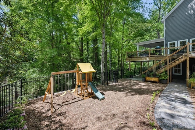 4152 Club Dr NE, Atlanta, GA 30319 - view of jungle gym with fence, stairs, and a deck